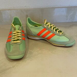 adidas Mint Green Sneakers with Neon Orange Stripes and Pale Yellow Laces